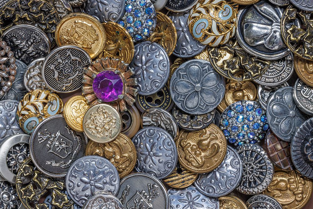 Close-up of variety of metal buttons.